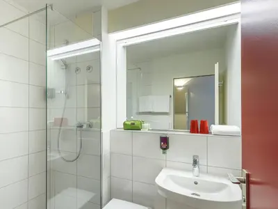 Ein Badezimmer in der Unterkunft AKZENT Hotel am Schlosspark Herten