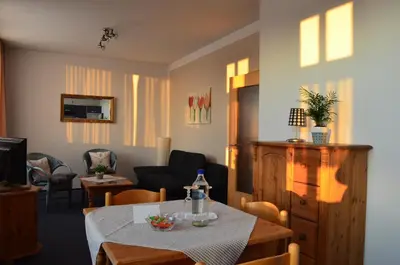 Ein Sitzbereich in der Unterkunft Hotel Alter Giebel