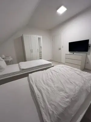 Ein Bett oder Betten in einem Zimmer der Unterkunft Premium Apartment Bochum near Düsseldorf Airport