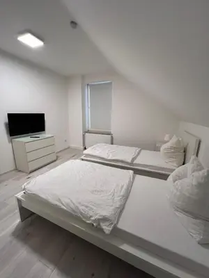 Ein Bett oder Betten in einem Zimmer der Unterkunft Premium Apartment Bochum near Düsseldorf Airport
