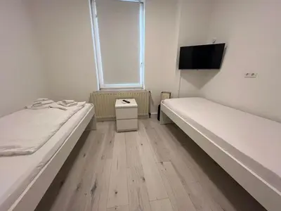 Ein Bett oder Betten in einem Zimmer der Unterkunft Premium Apartment Bochum near Düsseldorf Airport