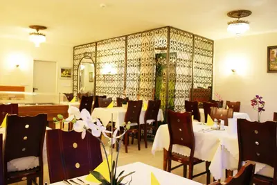 Ein Restaurant oder anderes Speiselokal in der Unterkunft Bahn-Hotel