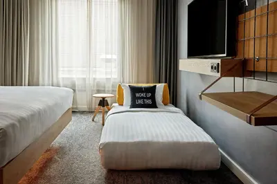 Ein Bett oder Betten in einem Zimmer der Unterkunft Moxy Bochum