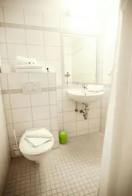 Ein Badezimmer in der Unterkunft Hotel Petul An der Zeche