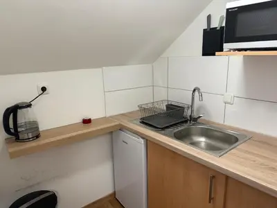 Küche/Küchenzeile in der Unterkunft Stadt-Gut-Hotel Zum Rathaus