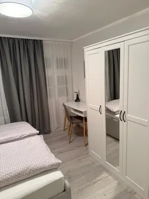 Ein Bett oder Betten in einem Zimmer der Unterkunft Ferienwohnung Wülfrath
