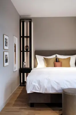 Ein Bett oder Betten in einem Zimmer der Unterkunft SAXX Hotel 