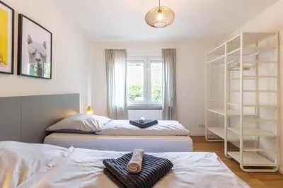 Ein Bett oder Betten in einem Zimmer der Unterkunft Glück Auf Appartements Walter-Hohmann-Straße Essen