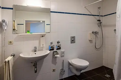Ein Badezimmer in der Unterkunft Hotel Birschel-Mühle