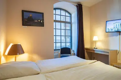 Ein Bett oder Betten in einem Zimmer der Unterkunft Hotel Birschel-Mühle