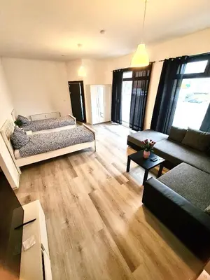 Ein Sitzbereich in der Unterkunft Loft Riva II - Terrasse, Smart TV, Klimaanlage, Parkplatz frei, Minibar
