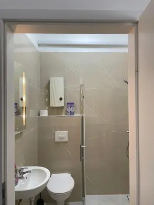 Ein Badezimmer in der Unterkunft Loft Riva II - Terrasse, Smart TV, Klimaanlage, Parkplatz frei, Minibar