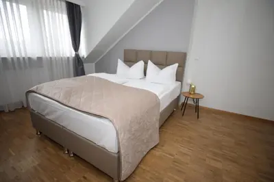 Ein Bett oder Betten in einem Zimmer der Unterkunft TM Hotel Düsseldorf