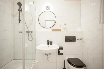 Ein Badezimmer in der Unterkunft TM Hotel Düsseldorf