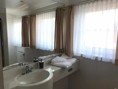 Ein Badezimmer in der Unterkunft Hotel Kranefoer