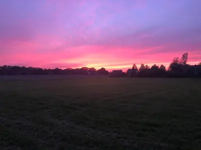 Blick auf den Sonnenuntergang/Sonnenaufgang von der Ferienwohnung aus oder aus der Nähe
