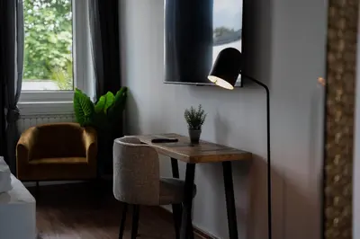 TV/Unterhaltungsangebot in der Unterkunft JUNIK Apartments im Stadtzentrum