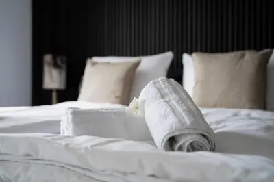 Ein Bett oder Betten in einem Zimmer der Unterkunft JUNIK Apartments im Stadtzentrum
