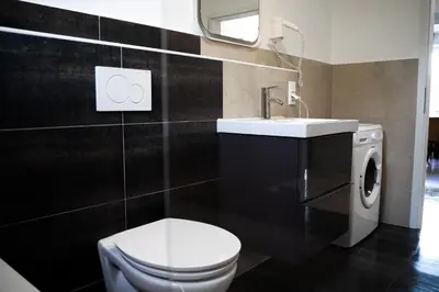 Ein Badezimmer in der Unterkunft JUNIK Apartments im Stadtzentrum