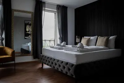 Ein Bett oder Betten in einem Zimmer der Unterkunft JUNIK Apartments im Stadtzentrum