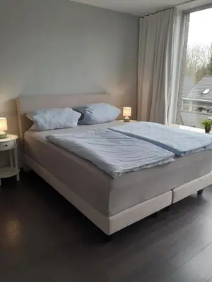 Ein Bett oder Betten in einem Zimmer der Unterkunft Apartment am Park