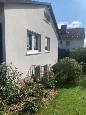 Ein Garten an der Unterkunft Sauerlandblick - Appartement & FeWo Wickede