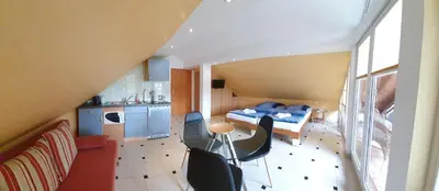 Ein Sitzbereich in der Unterkunft Studio Wille