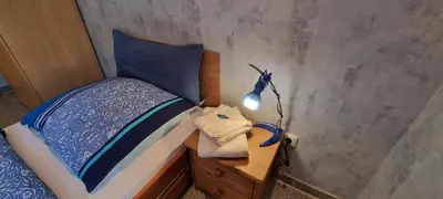 Ein Bett oder Betten in einem Zimmer der Unterkunft Ferienwohnung Wille