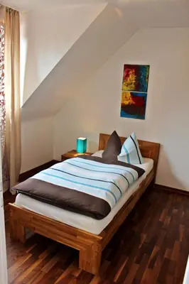 Ein Bett oder Betten in einem Zimmer der Unterkunft Bel Etage