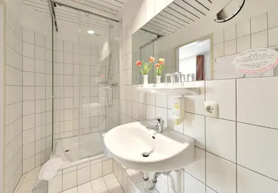 Ein Badezimmer in der Unterkunft Hotel Haus Kronenthal