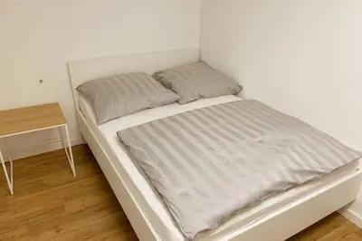 Ein Bett oder Betten in einem Zimmer der Unterkunft Apartment I , Netflix, Küche und Gym
