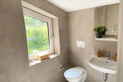 Ein Badezimmer in der Unterkunft Apartment I , Netflix, Küche und Gym