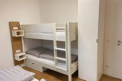 Ein Bett oder Betten in einem Zimmer der Unterkunft Apartment I , Netflix, Küche und Gym