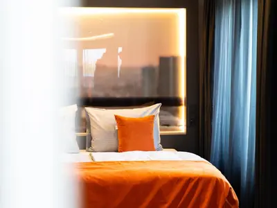 Ein Bett oder Betten in einem Zimmer der Unterkunft JustStay Mülheim Hotel & Apartments