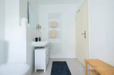 Ein Bett oder Betten in einem Zimmer der Unterkunft cruwzo I Apartments am Uniklinikum