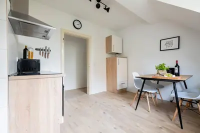 Küche/Küchenzeile in der Unterkunft cruwzo I Apartments am Uniklinikum