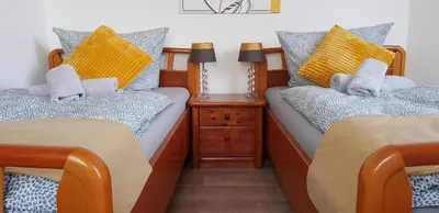 Ein Bett oder Betten in einem Zimmer der Unterkunft ELENA flat Tulpe Duisburg Zentrum