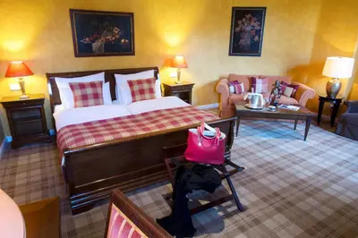 Ein Sitzbereich in der Unterkunft Schlosshotel Hugenpoet