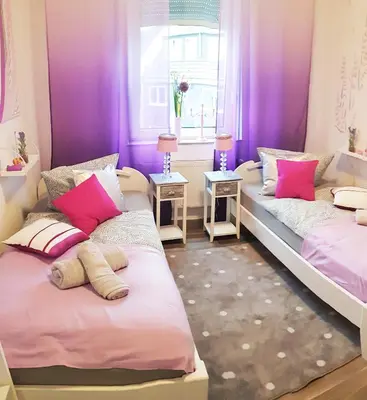 Ein Bett oder Betten in einem Zimmer der Unterkunft ELENA flat Lavendel Duisburg Zentrum