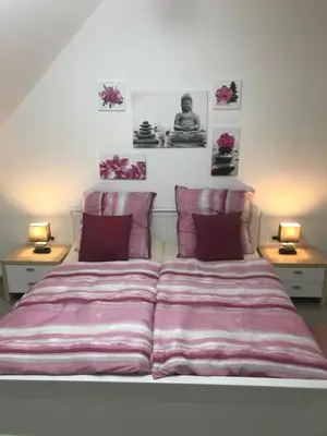 Ein Bett oder Betten in einem Zimmer der Unterkunft Sweet Home Appartements 1