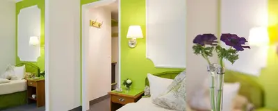 Ein Bett oder Betten in einem Zimmer der Unterkunft Gildors Hotel Atmosphère