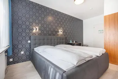Ein Bett oder Betten in einem Zimmer der Unterkunft Hotel Union by TM