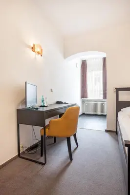 Ein Bett oder Betten in einem Zimmer der Unterkunft Hotel Union by TM