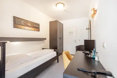 Ein Bett oder Betten in einem Zimmer der Unterkunft Hotel Union by TM