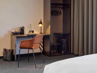 Ein Bett oder Betten in einem Zimmer der Unterkunft B&B HOTEL Wuppertal-City
