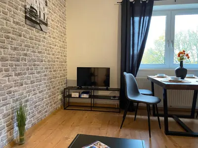 TV/Unterhaltungsangebot in der Unterkunft Moderne Wohnung bei Duisburg Hbf.