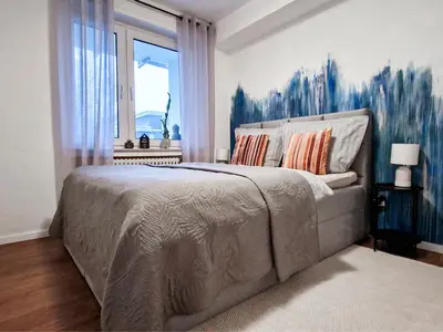 Ein Bett oder Betten in einem Zimmer der Unterkunft Oase am Großstadt Jungel