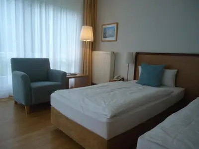 Ein Bett oder Betten in einem Zimmer der Unterkunft Thiesmann´s Hotel & Restaurant