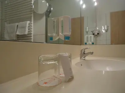 Ein Badezimmer in der Unterkunft Thiesmann´s Hotel & Restaurant