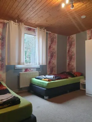 Ein Bett oder Betten in einem Zimmer der Unterkunft Ferienwohnungen lemberg
